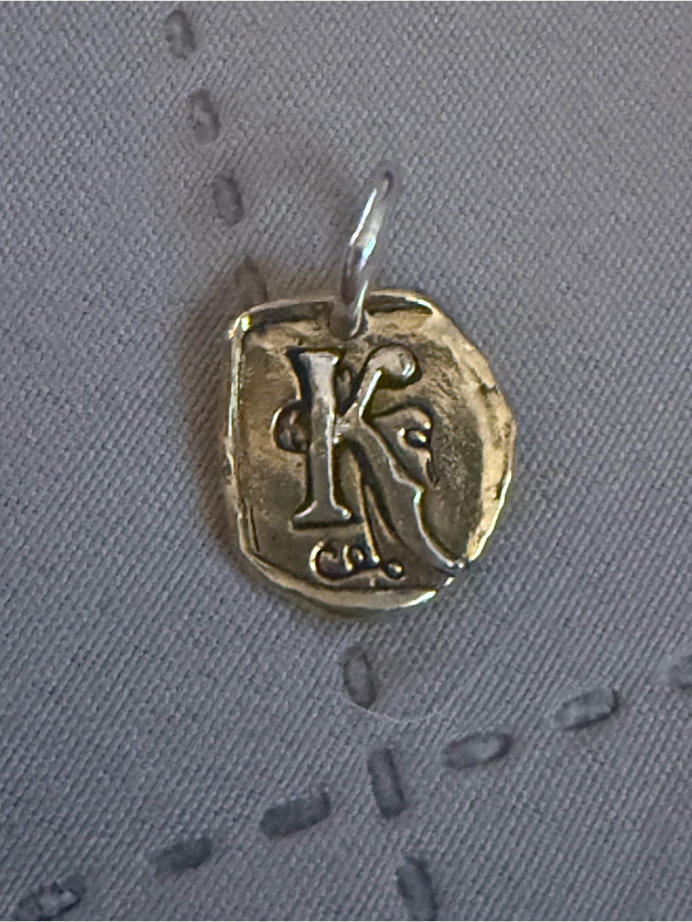NWOT.  Waxing Poetic brass and sterling silver ‘K’ Initial Charm